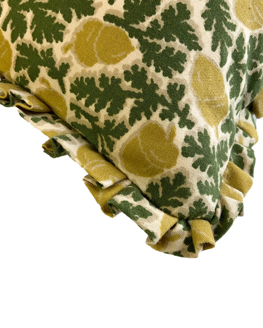 Cushion in “Acorn” Print with Ruffles in green/mustard
